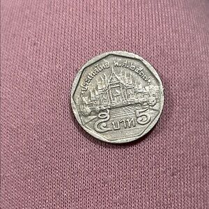 Thailand 5 Baht coin from the reign of King Bhumibol Adulyadej (Rama IX).